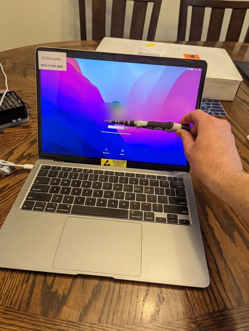 New laptop being set up and configured for a customer